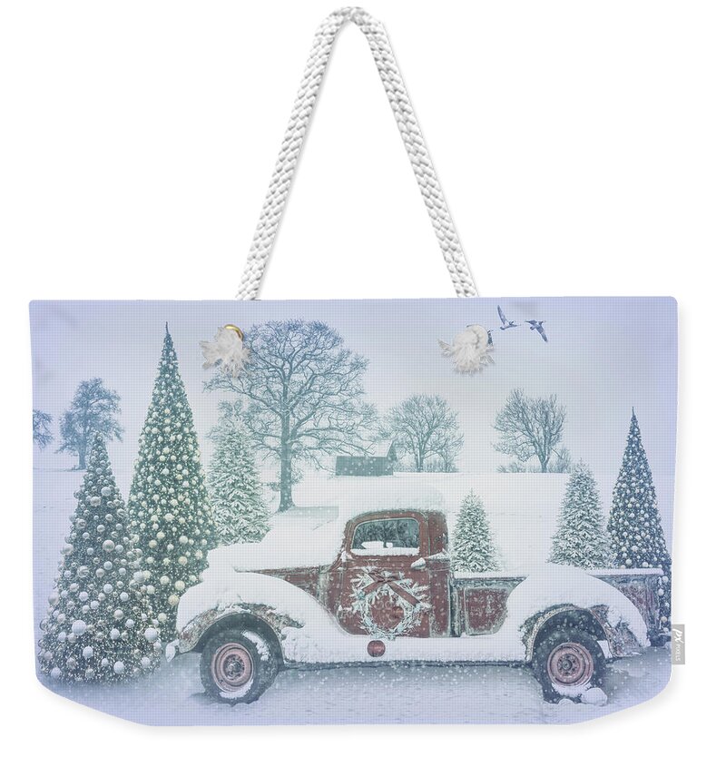 Christmas Weekender Tote Bag featuring the photograph Snowy Pale Red Truck by Debra and Dave Vanderlaan