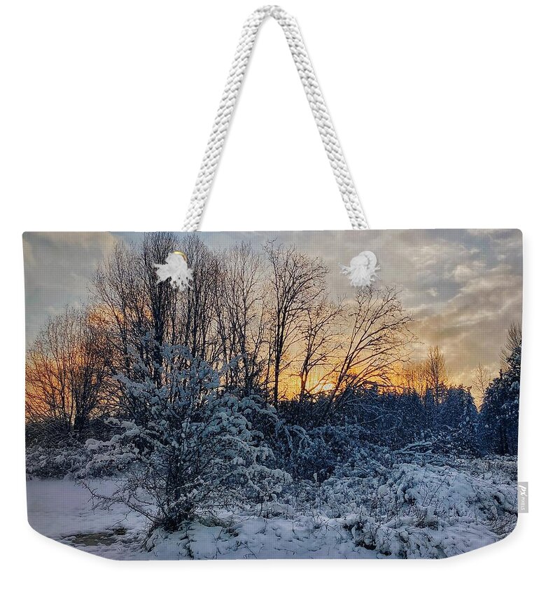 Snow Weekender Tote Bag featuring the photograph Snowy Sunset Silhouette by Jerry Abbott