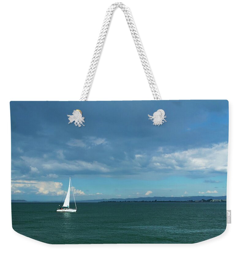 Sailboat Weekender Tote Bag featuring the photograph Social Distancing on The Bay by Bonnie Follett