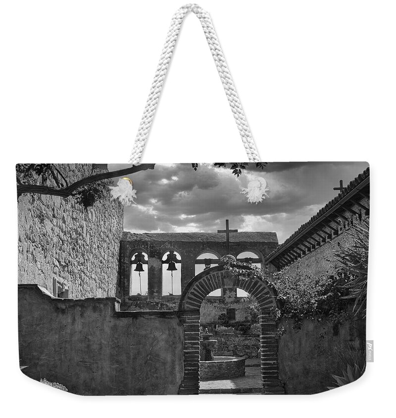 Cross Weekender Tote Bag featuring the photograph Solace by Daniel Hayes