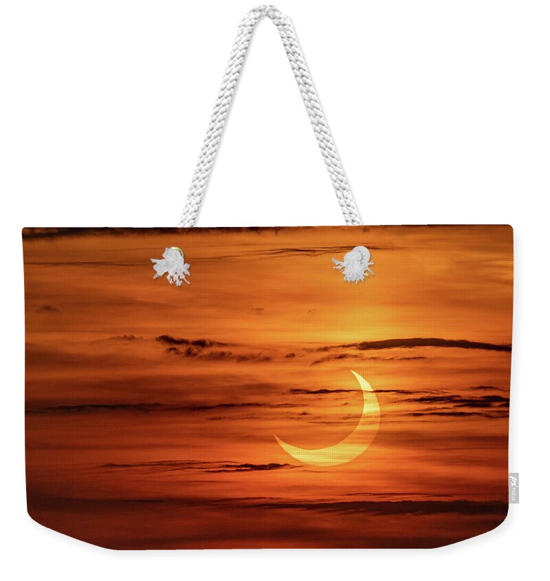 New York Weekender Tote Bag featuring the photograph Solar Eclipse 2021 by Kevin Suttlehan