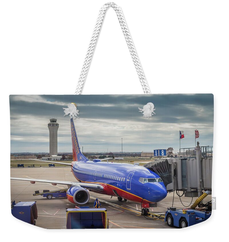 Southwest Airlines Weekender Tote Bag featuring the photograph Southwest Airlines in Austin Texas by Robert Bellomy