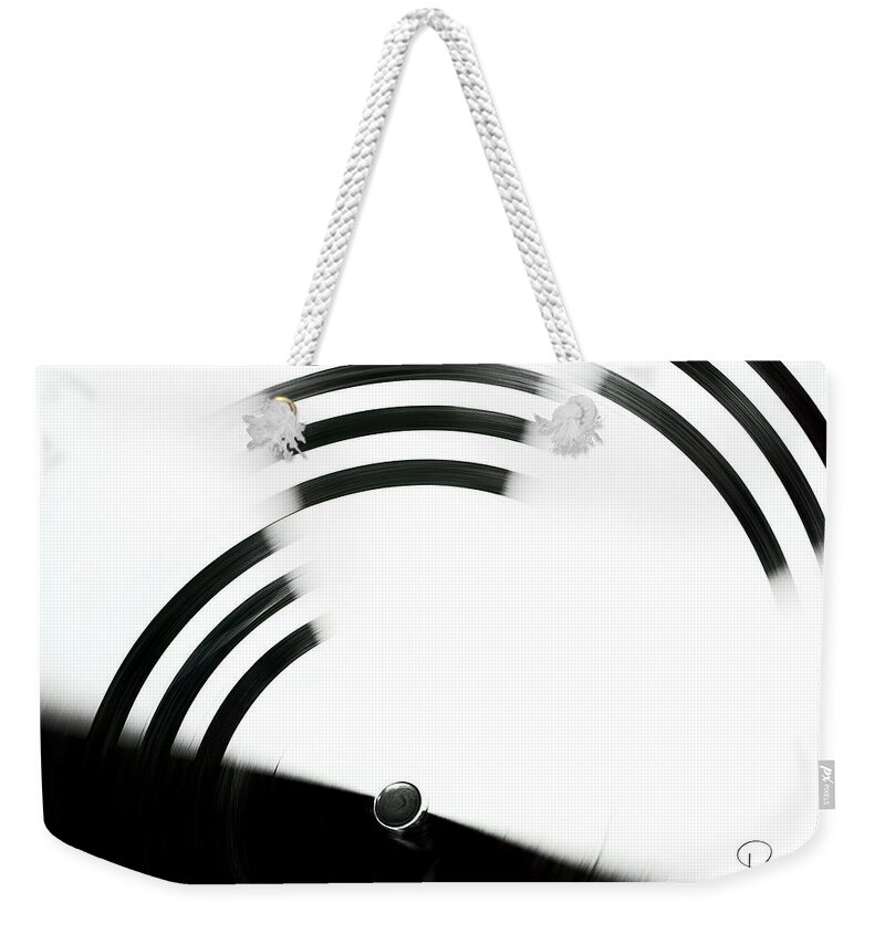 Black And White Photography Weekender Tote Bag featuring the photograph Spinner by Dee Browning