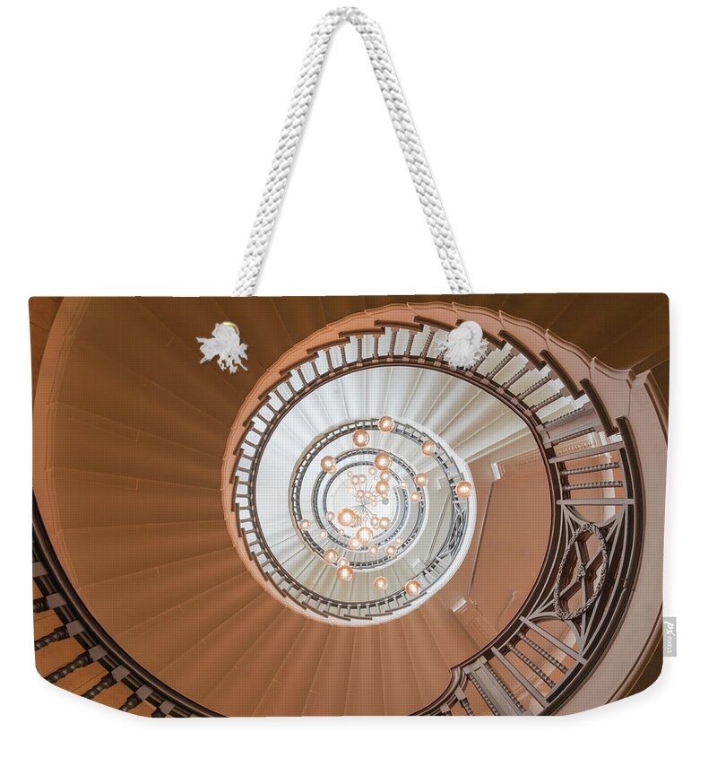 Spiral Staircase Weekender Tote Bag featuring the photograph Spiral staircase by Andrew Lalchan