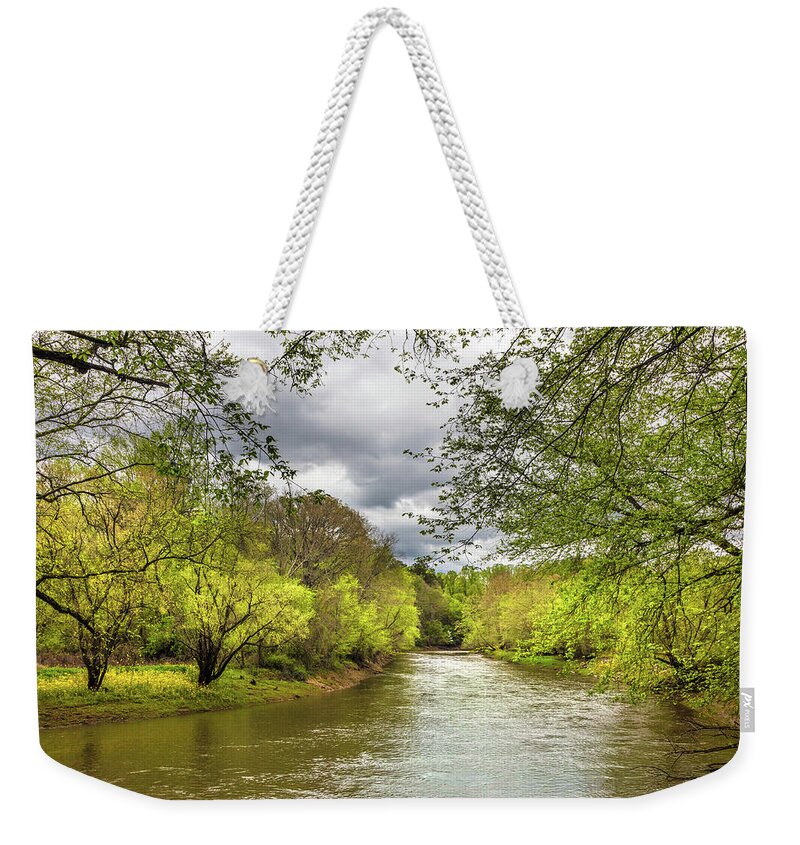 Carolina Weekender Tote Bag featuring the photograph Springtime on the River by Debra and Dave Vanderlaan