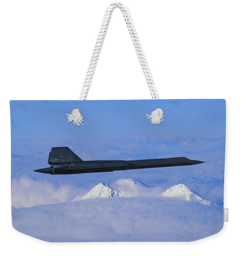 Lockheed Sr-71 Blackbird Weekender Tote Bag featuring the mixed media SR-71 Blackbird Over Snowcapped Mountains by Erik Simonsen