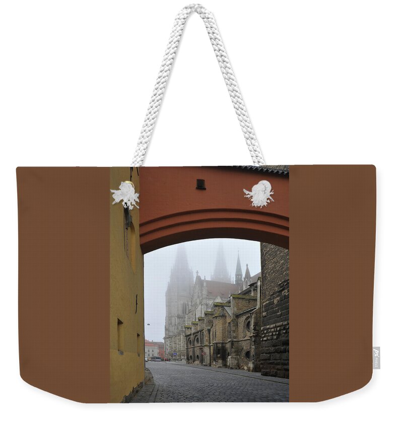 Germany Weekender Tote Bag featuring the photograph St Peters Cathedral in Regensburg Germany from a Distance by James C Richardson