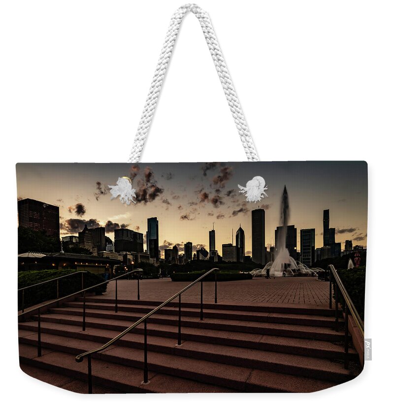 Chicago Weekender Tote Bag featuring the photograph Stairs lead into Chicago's Buckingham fountain by Sven Brogren