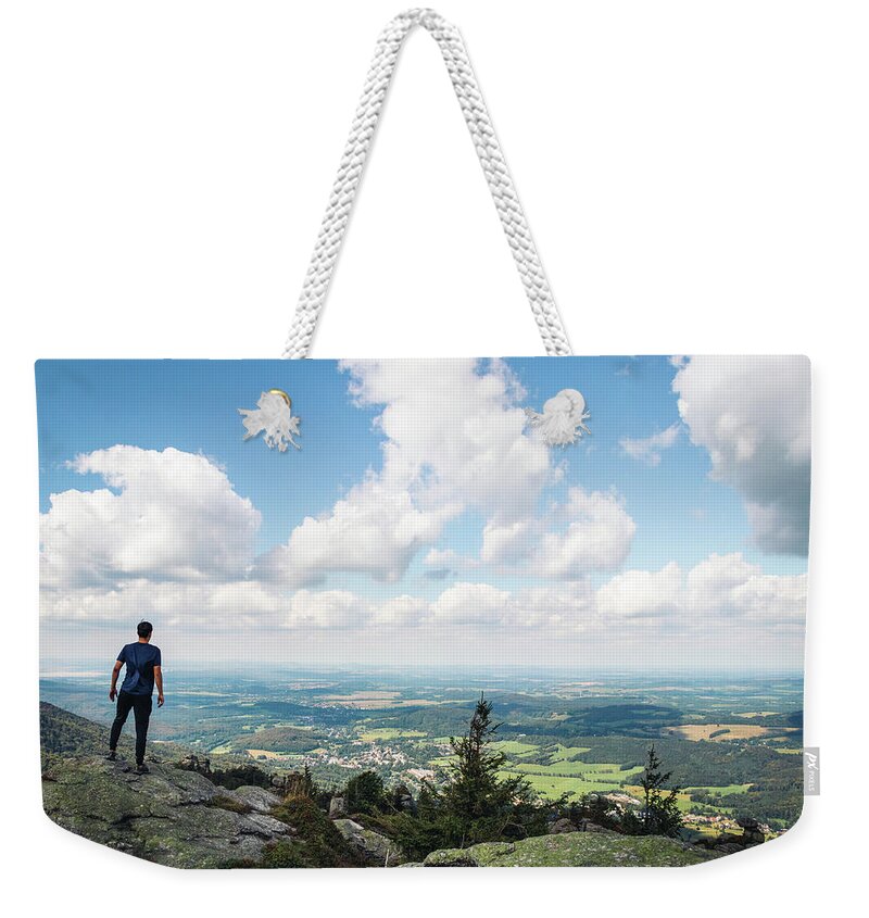 Outdoor Weekender Tote Bag featuring the photograph Standing on a rock in Jizera mountains by Vaclav Sonnek
