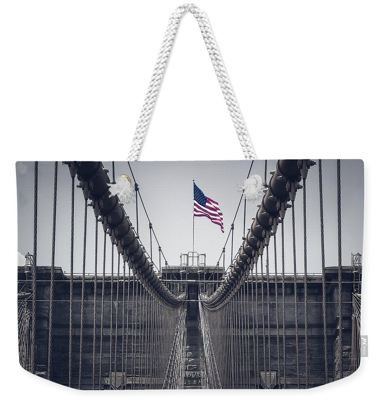 America Weekender Tote Bag featuring the photograph Stars and stripes above Brooklyn bridge by Jean-Luc Farges