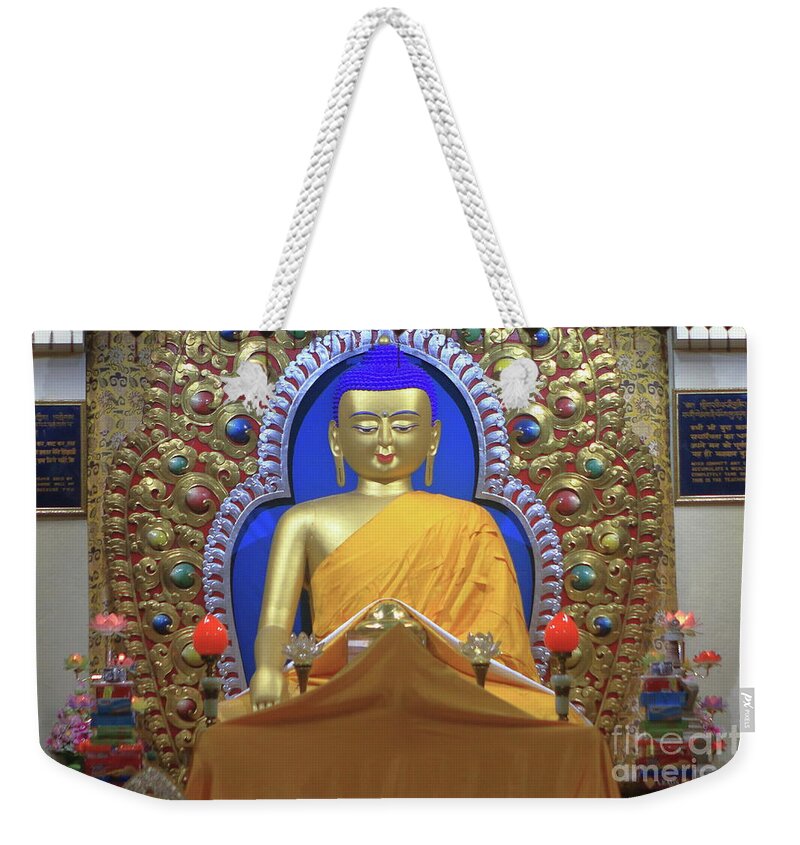 Statue Weekender Tote Bag featuring the photograph Statue Of The Buddha by Aidan Moran