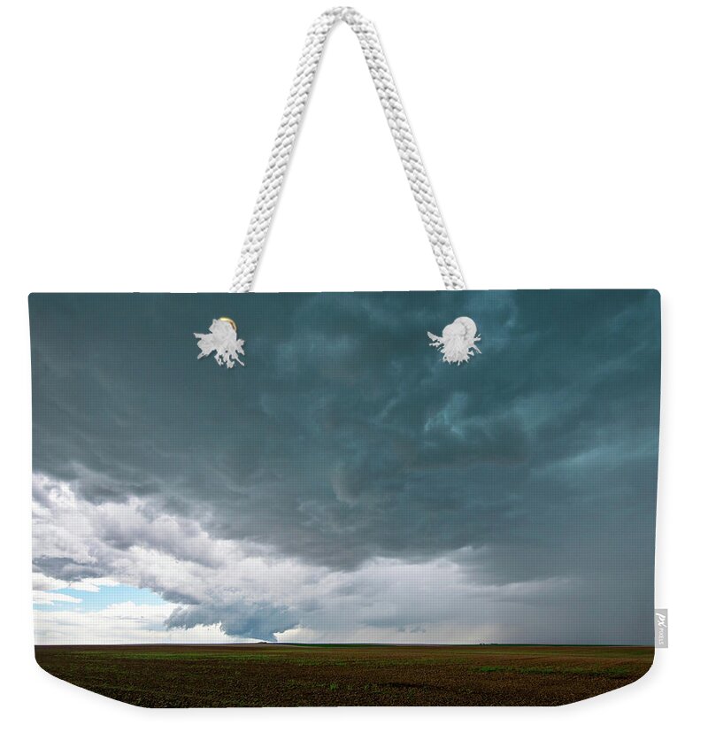 Storm Weekender Tote Bag featuring the photograph Storm over the Plains by Wesley Aston