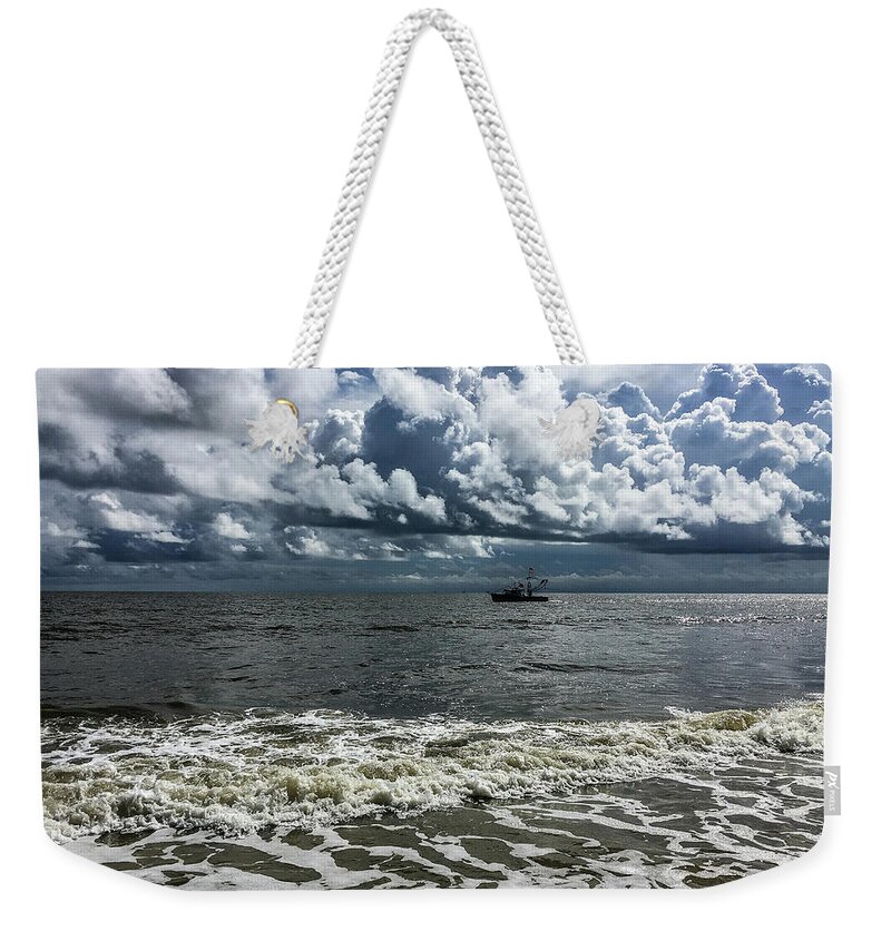 Ocean Weekender Tote Bag featuring the photograph Stormy Boat by David Beechum