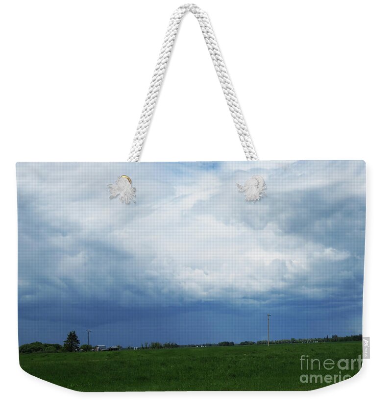 Dramatic Weekender Tote Bag featuring the photograph Stormy Skies by Mary Mikawoz