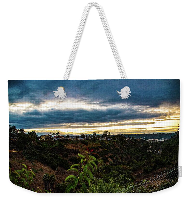 Stormy Weekender Tote Bag featuring the photograph Stormy Sky 1 by Phyllis Spoor