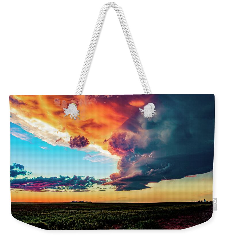 Sunset Weekender Tote Bag featuring the photograph Stormy Sunset by Marcus Hustedde