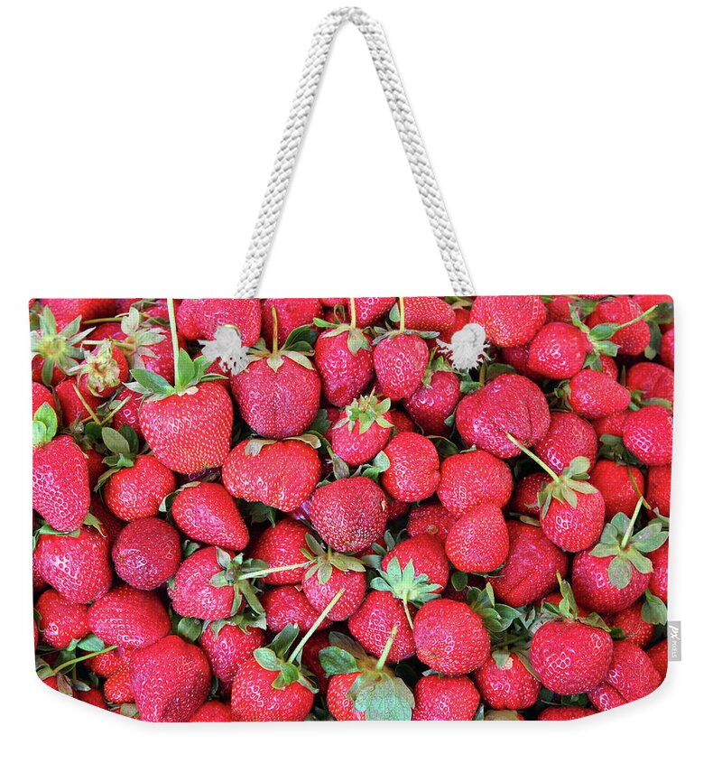 Strawberry Weekender Tote Bag featuring the photograph Strawberry Background by Mikhail Kokhanchikov