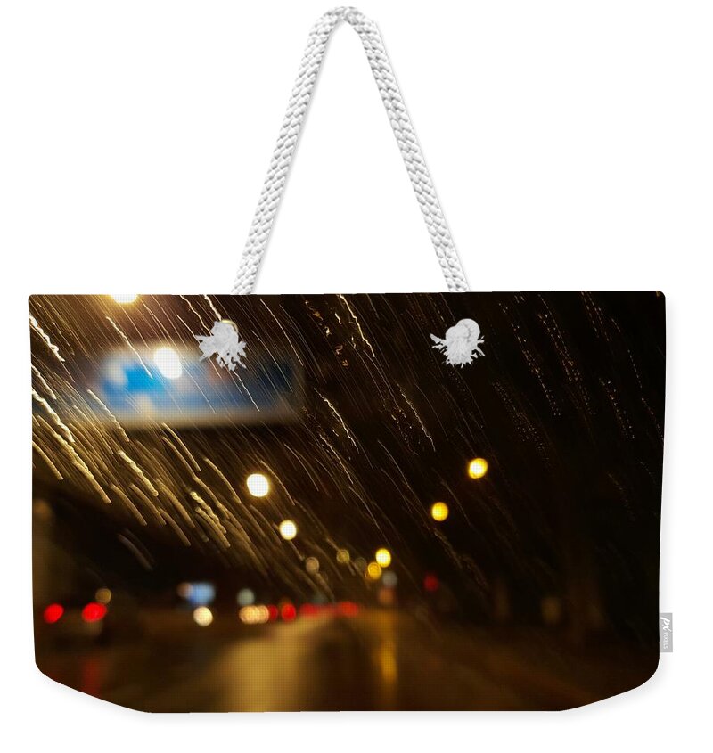 Rain Weekender Tote Bag featuring the photograph Streaks of rain by Faa shie