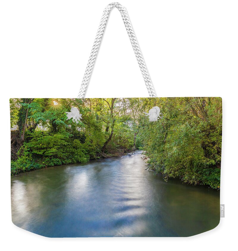 Stream Weekender Tote Bag featuring the photograph Stream with smooth water by Fabiano Di Paolo