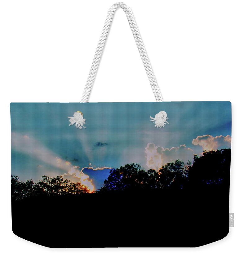 Sunset Weekender Tote Bag featuring the photograph Streaming Sunset by Christopher Reed