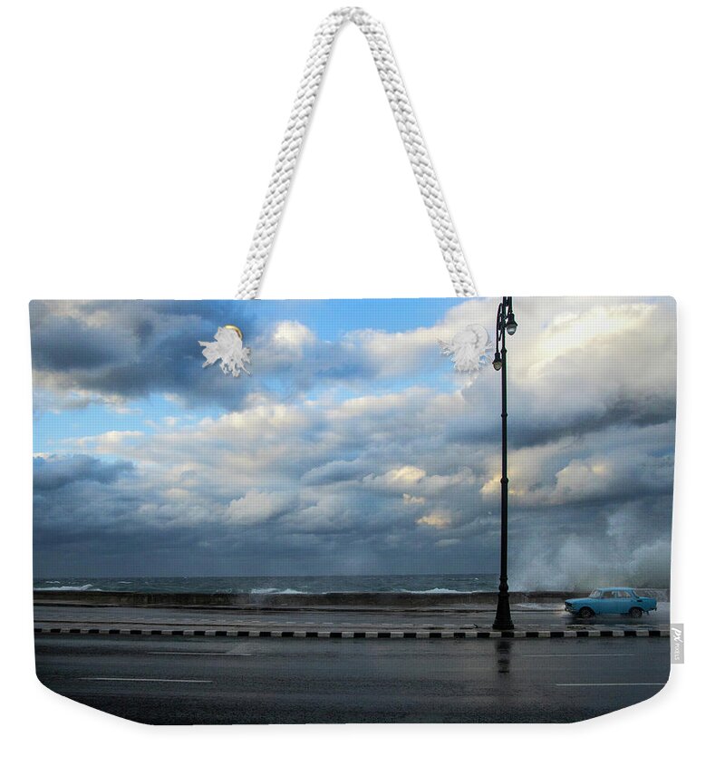 Cuba Weekender Tote Bag featuring the photograph Strong wind on the Malecon by Micah Offman