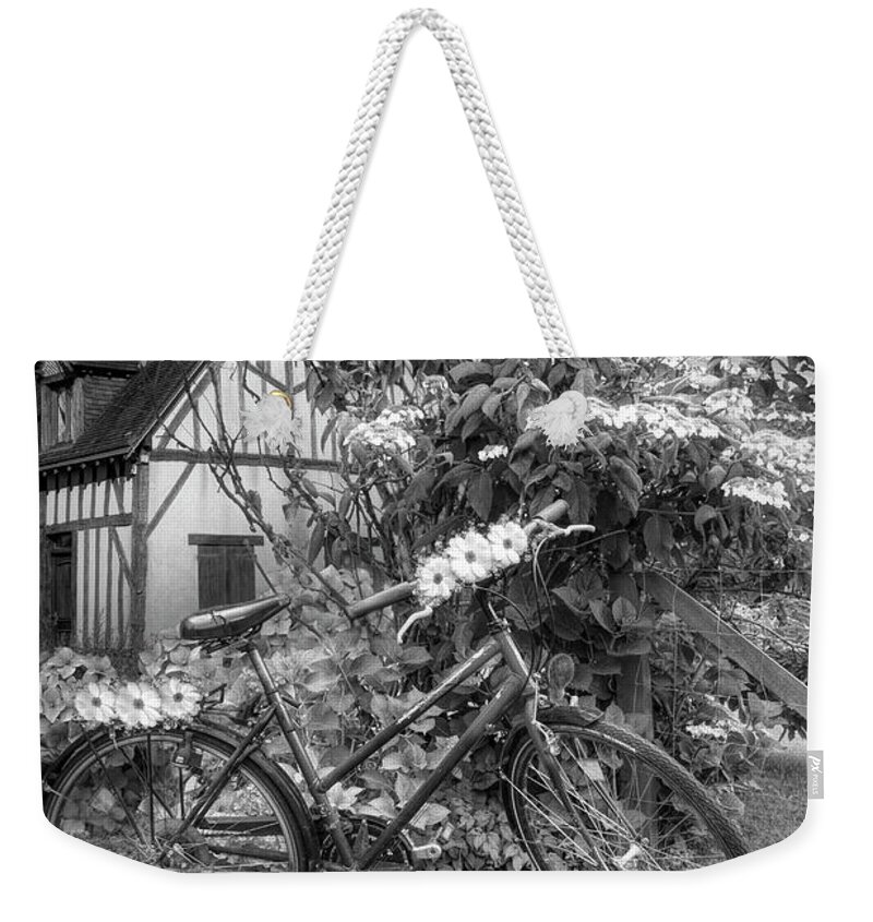 Barns Weekender Tote Bag featuring the photograph Summer Cycling in Flowers Black and White by Debra and Dave Vanderlaan