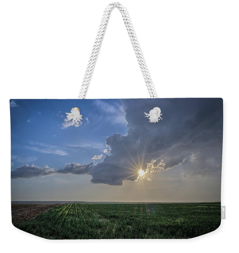 Sun Weekender Tote Bag featuring the photograph Sun Flare by Laura Hedien
