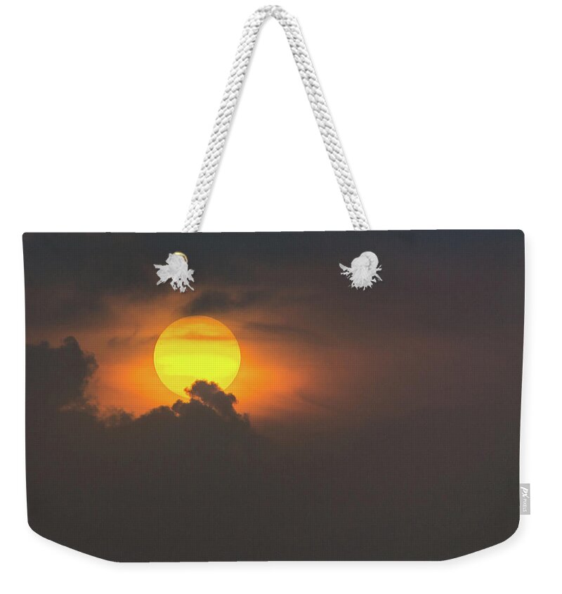 Clouds Weekender Tote Bag featuring the photograph Sun popping into clouds by Andrew Lalchan
