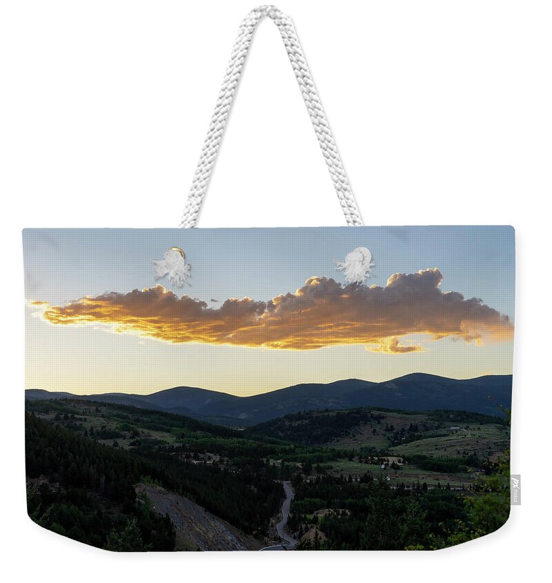 Sunset Weekender Tote Bag featuring the photograph Sun setting Central City by Cathy Anderson