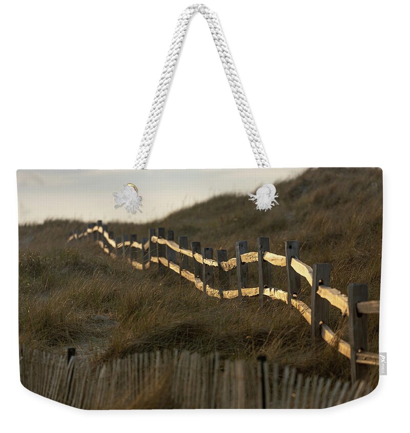 Sunshine Weekender Tote Bag featuring the photograph Sunny Beach Fence by Denise Kopko