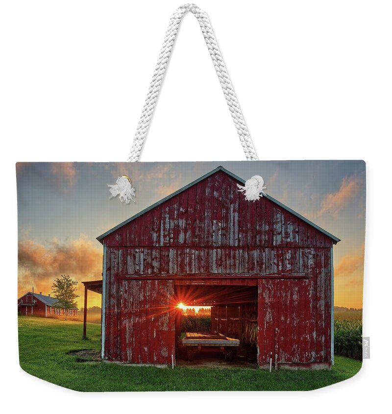 Tobacco Weekender Tote Bag featuring the photograph Sunrise at the Veum Tobacco Shed near Stoughton Wisconsin by Peter Herman
