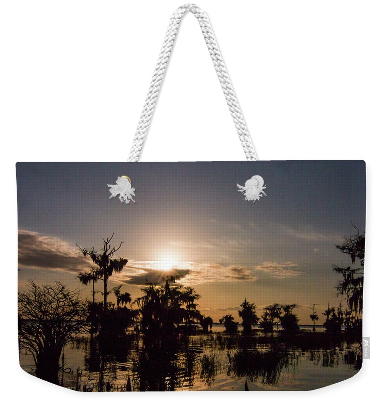 Blue Cypress Lake Weekender Tote Bag featuring the photograph Sunrise on Florida lake by Dorothy Cunningham