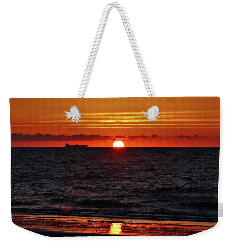 Isle Of Wight Sandown Sunrise Ship Silhouette Weekender Tote Bag featuring the photograph Sunrise on Sandown Beach Isle of Wight by Jeremy Hayden
