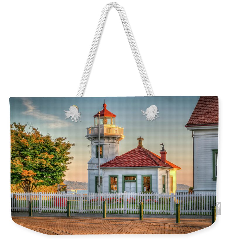 Mukilteo Weekender Tote Bag featuring the photograph Sunrise On The Lighthouse by Spencer McDonald