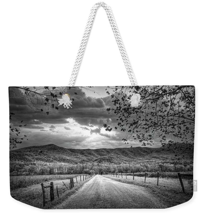 Cades Weekender Tote Bag featuring the photograph Sunrise over Sparks Lane Black and White by Debra and Dave Vanderlaan