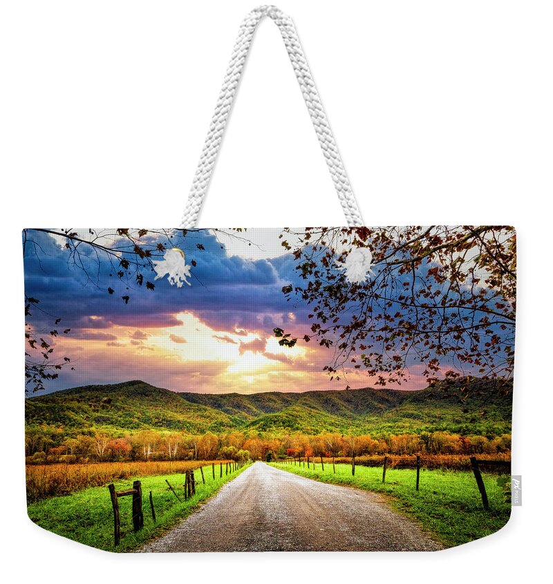Cades Weekender Tote Bag featuring the photograph Sunrise over Sparks Lane by Debra and Dave Vanderlaan