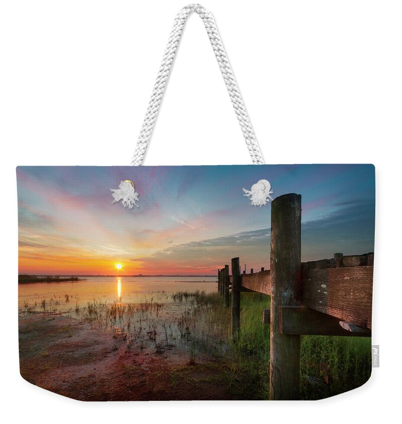 Clouds Weekender Tote Bag featuring the photograph Sunrise Over the Lake by Debra and Dave Vanderlaan