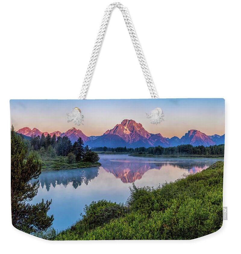 National Park Weekender Tote Bag featuring the photograph Sunriset at Oxbow Bend by Larey McDaniel