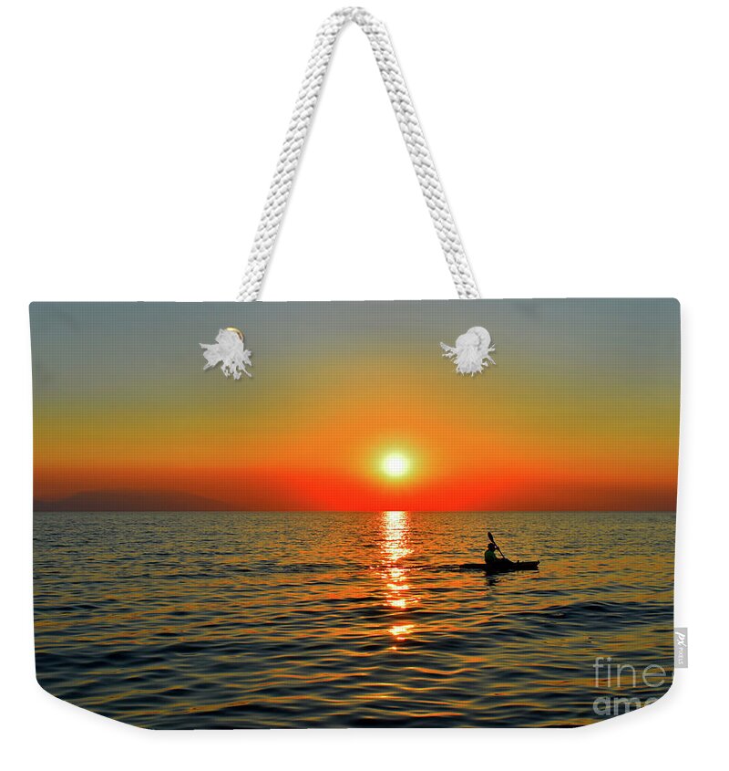 Sunset Weekender Tote Bag featuring the photograph Sunset Above Seascape With Kayaker  by Leonida Arte