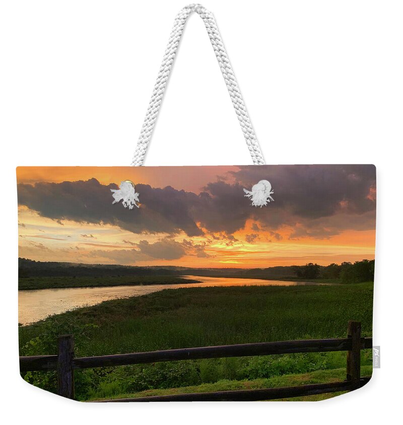 Sunset Weekender Tote Bag featuring the photograph Sunset after a storm by David Pratt