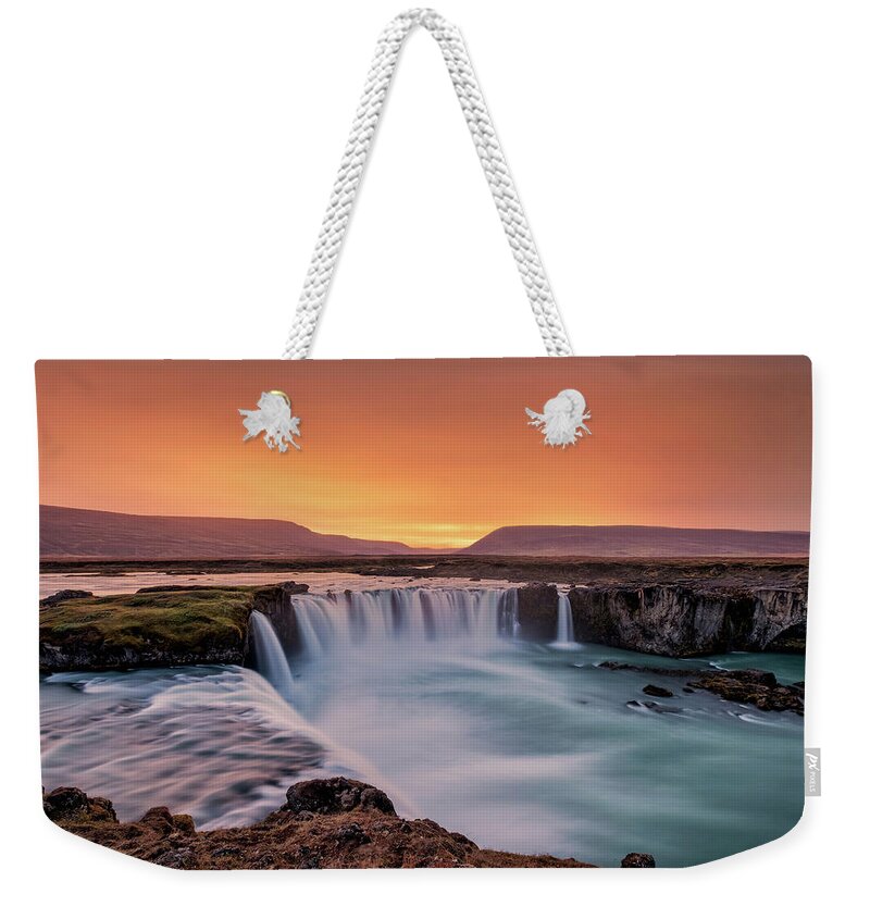 Godafoss Weekender Tote Bag featuring the photograph Sunset at Godafoss waterfall by Alexios Ntounas