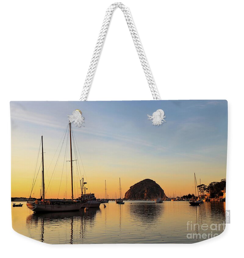 Morro Bay Weekender Tote Bag featuring the photograph Sunset at Morro Rock by Vivian Krug Cotton