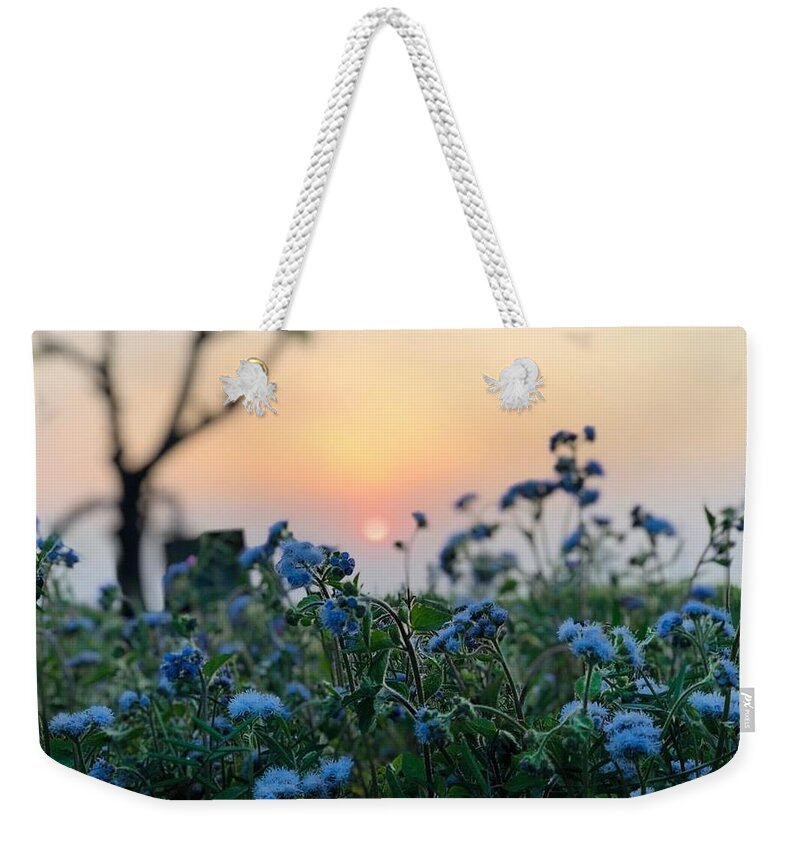 Flowers Weekender Tote Bag featuring the photograph Sunset Behind Flowers by Prashant Dalal