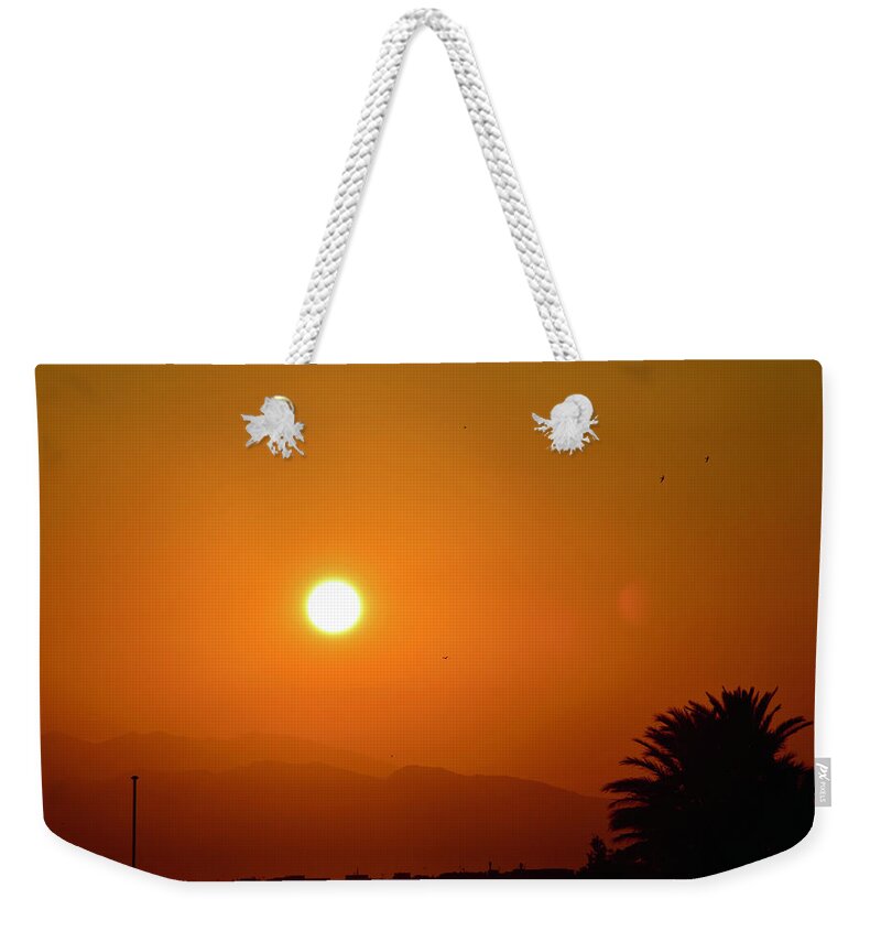 Sunset Weekender Tote Bag featuring the photograph Sunset in Roses by Monika Salvan