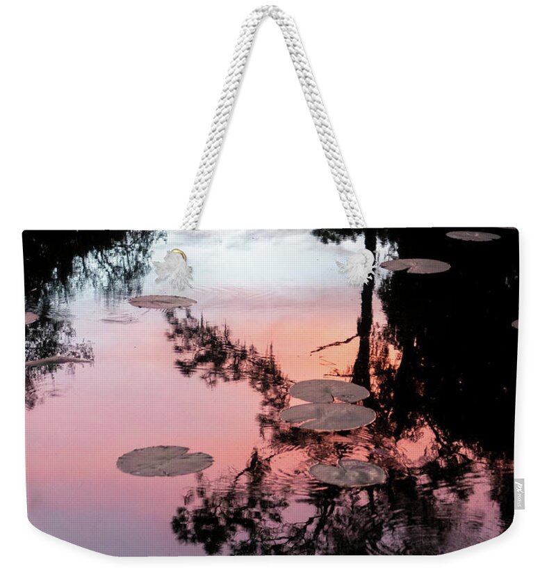 Reflection Weekender Tote Bag featuring the photograph Sunset on a Florida pond by Karen Rispin
