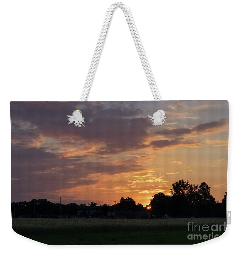 Sunset Weekender Tote Bag featuring the photograph Sunset at the edge of the forest 1 by Adriana Mueller