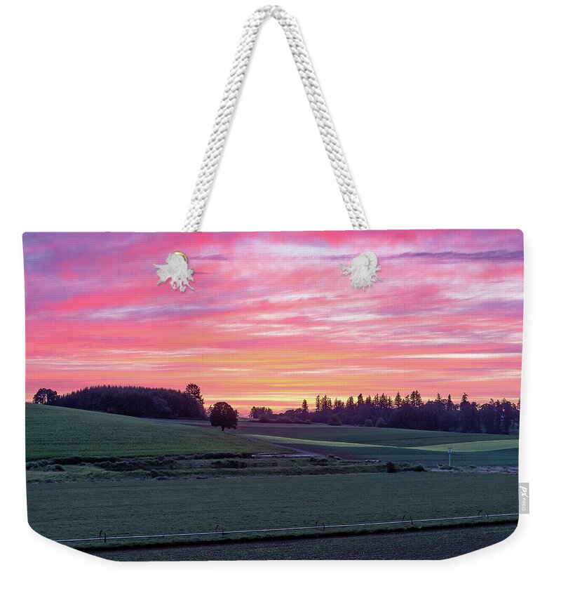 Evans Valley Weekender Tote Bag featuring the photograph Sunset on the farm by Ulrich Burkhalter