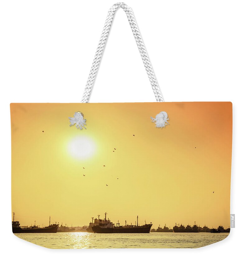 Asia Weekender Tote Bag featuring the photograph Sunset on the Karnaphuli River by Alexey Stiop