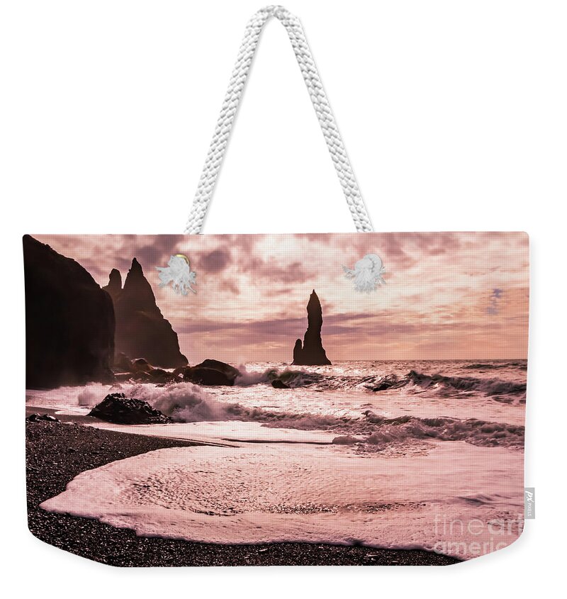 Reynisfjara Weekender Tote Bag featuring the photograph Sunset on the Reynisfjara black sand beach, Iceland by Lyl Dil Creations