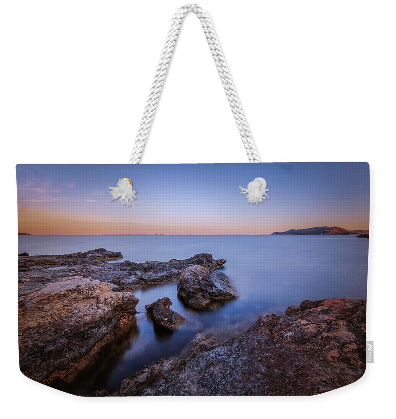 Seascape Weekender Tote Bag featuring the photograph Sunset on the Rocks by Rick Deacon